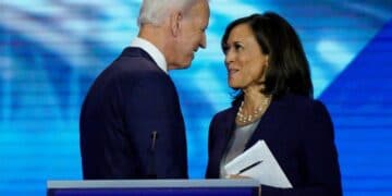 FILE - In this Sept. 12, 2019, file photo, Democratic presidential candidate former Vice President Joe Biden, left, and then-candidate Sen. Kamala Harris, D-Calif. shake hands after a Democratic presidential primary debate hosted by ABC at Texas Southern University in Houston. Biden has chosen Harris as his running mate. (AP Photo/David J. Phillip, File)