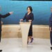 From left, Chancellor candidates Olaf Scholz (SPD), Annalena Baerbock (Green Party) and Armin Laschet (CDU) stand in the TV studio in Berlin, Sunday, Sept. 12, 2021. With two weeks left before Germany’s national election, the three candidates for chancellorship are facing off Sunday in the second of three televised election debates. (Michael Kappeler/Pool via AP)