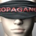 Propaganda can make things harder to see or makes us blind to the reality - pictured as word Propaganda on a blindfold to symbolize denial and that Propaganda can cloud perception, 3d illustration.