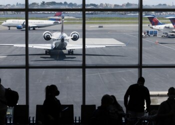 Delta Air Lines planes on the tarmac at Terminal C of LaGuardia Airport (LGA) in New York, U.S., on Monday, Aug. 2, 2021. Citing a surge in unruly passengers, U.S. aviation regulators are calling on the nation's airports to encourage the police to arrest offenders, and to prevent people from sneaking alcohol on board. Photographer: Angus Mordant/Bloomberg via Getty Images