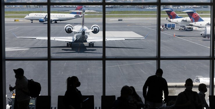 Delta Air Lines planes on the tarmac at Terminal C of LaGuardia Airport (LGA) in New York, U.S., on Monday, Aug. 2, 2021. Citing a surge in unruly passengers, U.S. aviation regulators are calling on the nation's airports to encourage the police to arrest offenders, and to prevent people from sneaking alcohol on board. Photographer: Angus Mordant/Bloomberg via Getty Images