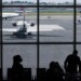 Delta Air Lines planes on the tarmac at Terminal C of LaGuardia Airport (LGA) in New York, U.S., on Monday, Aug. 2, 2021. Citing a surge in unruly passengers, U.S. aviation regulators are calling on the nation's airports to encourage the police to arrest offenders, and to prevent people from sneaking alcohol on board. Photographer: Angus Mordant/Bloomberg via Getty Images