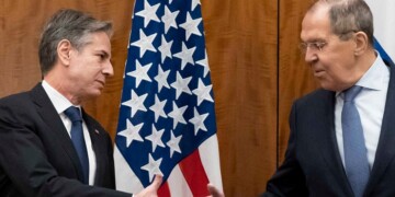 Secretary of State Antony Blinken greets Russian Foreign Minister Sergey Lavrov before their meeting, Friday, Jan. 21, 2022, in Geneva, Switzerland. (AP Photo/Alex Brandon, Pool)