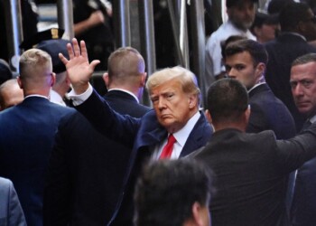Former US president Donald Trump arrives ahead of his arraignment at the Manhattan Federal Court in New York City on April 4, 2023. - Former US President Donald Trump is to be booked, fingerprinted, and will have a mugshot taken at a Manhattan courthouse on the afternoon of April 4, 2023, before appearing before a judge as the first ever American president to face criminal charges. (Photo by ANDREW CABALLERO-REYNOLDS / AFP) (Photo by ANDREW CABALLERO-REYNOLDS/AFP via Getty Images)