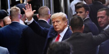 Former US president Donald Trump arrives ahead of his arraignment at the Manhattan Federal Court in New York City on April 4, 2023. - Former US President Donald Trump is to be booked, fingerprinted, and will have a mugshot taken at a Manhattan courthouse on the afternoon of April 4, 2023, before appearing before a judge as the first ever American president to face criminal charges. (Photo by ANDREW CABALLERO-REYNOLDS / AFP) (Photo by ANDREW CABALLERO-REYNOLDS/AFP via Getty Images)