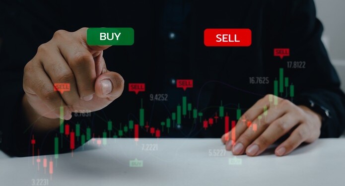 Finance graph with a businessman hand touching a button Stock market exchange future analysis investment forex virtual screen Business digital interface technology concept.