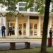 Police officers stand guard outside the high school where a man stabbed a teacher, Saturday Oct.14, 2023 in Arras, northern France. A man of Chechen origin who was under surveillance by French security services over suspected Islamic radicalization stabbed a teacher to death at his former high school and wounded three other people Friday in Arras. (AP Photo/Jeffrey Schaeffer)