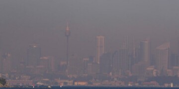 FILE - A thick blanket of smoke hangs over parts of the Sydney, Sept. 14, 2023, following New South Wales Rural Fire Service (RFS) hazard reduction burns in the past week. Sydney has on Tuesday, Sept. 19, 2023, experienced its first total fire ban in almost three years and several schools on the New South Wales state South Coast were closed because of a heightened wildfire danger with extraordinarily high temperatures across southeast Australia. (AP Photo/Mark Baker, File)