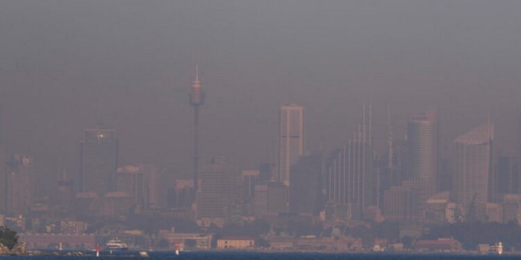 FILE - A thick blanket of smoke hangs over parts of the Sydney, Sept. 14, 2023, following New South Wales Rural Fire Service (RFS) hazard reduction burns in the past week. Sydney has on Tuesday, Sept. 19, 2023, experienced its first total fire ban in almost three years and several schools on the New South Wales state South Coast were closed because of a heightened wildfire danger with extraordinarily high temperatures across southeast Australia. (AP Photo/Mark Baker, File)