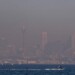 FILE - A thick blanket of smoke hangs over parts of the Sydney, Sept. 14, 2023, following New South Wales Rural Fire Service (RFS) hazard reduction burns in the past week. Sydney has on Tuesday, Sept. 19, 2023, experienced its first total fire ban in almost three years and several schools on the New South Wales state South Coast were closed because of a heightened wildfire danger with extraordinarily high temperatures across southeast Australia. (AP Photo/Mark Baker, File)