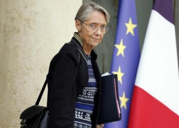 (FILES) French Prime Minister Elisabeth Borne leaves at the end of the weekly cabinet meeting at the Elysee palace in Paris, on October 5, 2022. French Prime Minister Elisabeth Borne has tendered her resignation from the government, French President Emmanuel Macron has accepted it, announced the presidency on January 8, 2024. (Photo by Ludovic MARIN / AFP)
