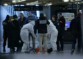 French forensic and judicial police work after a knife attack at Paris's Gare de Lyon railway station, a major travel hub on February 3, 2024. Police said that the suspected attacker had been arrested and that the motives behind the attack were unclear. The 8:00 am (0700 GMT) attack left one person with serious injuries while two others were lightly wounded. (Photo by Thomas SAMSON / AFP)