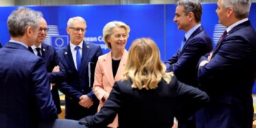 European Commission President Ursula von der Leyen, center left, speaks with from left, Slovenia's Prime Minister Robert Golob, Luxembourg's Prime Minister Luc Frieden, Bulgaria's Prime Minister Nikolai Denkov, Greece's Prime Minister Kyriakos Mitsotakis and Austria's Chancellor Karl Nehammer during a round table meeting at an EU Summit in Brussels, Thursday, March 21, 2024. European Union leaders are gathering to consider new ways to help boost arms and ammunition production for Ukraine. Leaders will also discuss in Thursday's summit the war in Gaza amid deep concern about Israeli plans to launch a ground offensive in the city of Rafah. (AP Photo/Geert Vanden Wijngaert)