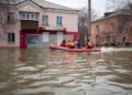 Emergency workers and police ride a boat during evacuations in a flooded street after parts of a dam burst, in Orsk, Russia on Monday, April 8, 2024. Floods caused by rising water levels in the Ural River broke a dam in a city near Russia's border with Kazakhstan, forcing some 2,000 people to evacuate, local authorities said. The dam broke in the city of Orsk in the Orenburg region, less than 12.4 miles north of the border on Friday night, according to Orsk mayor Vasily Kozupitsa. (AP Photo)