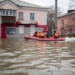 Emergency workers and police ride a boat during evacuations in a flooded street after parts of a dam burst, in Orsk, Russia on Monday, April 8, 2024. Floods caused by rising water levels in the Ural River broke a dam in a city near Russia's border with Kazakhstan, forcing some 2,000 people to evacuate, local authorities said. The dam broke in the city of Orsk in the Orenburg region, less than 12.4 miles north of the border on Friday night, according to Orsk mayor Vasily Kozupitsa. (AP Photo)