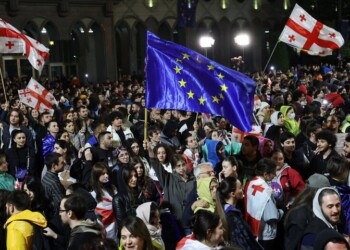 Georgian students rally to protest the controversial "foreign influence" bill outside the parliament in Tbilisi on May 13, 2024. (Photo by Giorgi ARJEVANIDZE / AFP) (Photo by GIORGI ARJEVANIDZE/AFP via Getty Images)