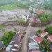 This handout aerial image taken and released by Indonesia's Disaster Mitigation Agency (BNPB) on May 12, 2024, shows the damaged area after flash floods and cold lava flow from a volcano in Tanah Datar, West Sumatra. At least 34 people have died and 16 more were missing after flash floods and cold lava flow from a volcano hit western Indonesia, a local disaster official said on May 12. (Photo by Handout / INDONESIA DISASTER MITIGATION AGENCY / AFP) / RESTRICTED TO EDITORIAL USE - MANDATORY CREDIT "AFP PHOTO / INDONESIA DISASTER MITIGATION AGENCY" - NO MARKETING NO ADVERTISING CAMPAIGNS - DISTRIBUTED AS A SERVICE TO CLIENTS