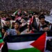 ANN ARBOR, MICHIGAN - MAY 4: Students demonstate during a Pro-Palestinian protest during the University of Michigan's spring commencement ceremony on May 4, 2024 at Michigan Stadium in Ann Arbor, Michigan. A group of students called for the University of Michigan to divest from companies with ties to Israel during the spring commencement ceremony.   Nic Antaya/Getty Images/AFP (Photo by Nic Antaya / GETTY IMAGES NORTH AMERICA / Getty Images via AFP)