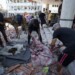 Palestinians search for bodies in the rubble of a school destroyed in an Israeli airstrike on Deir al-Balah, central Gaza Strip, Saturday, July 27, 2024. (AP Photo/Abdel Kareem Hana)