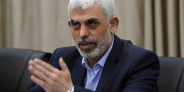 Yahya Sinwar, head of Hamas in Gaza, greets his supporters during a meeting with leaders of Palestinian factions at his office in Gaza City, Wednesday, April 13, 2022. The chief prosecutor of the International Criminal Court said Monday he is seeking arrest warrants for Israeli and Hamas leaders, including Israeli Prime Minister Benjamin Netanyahu, in connection with their actions during the seven-month war between Israel and Hamas. Yahya Sinwar is one of the three Hamas leaders believed to be responsible for war crimes and crimes against humanity in the Gaza Strip and Israel. (AP Photo/Adel Hana)