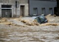 A car is submerged in water in a flooded street in Glucholazy, southern Poland, on September 15, 2024. One person has drowned in Poland and an Austrian fireman has died responding to floods, authorities said, as Storm Boris lashed central and eastern Europe with torrential rains. Since Thursday, September 12, 2024, swathes of Austria, the Czech Republic, Hungary, Romania and Slovakia have been hit by high winds and unusually fierce rainfall. The storm had already caused the death of five people in Romania, and thousands have been evacuated from their homes across the continent. (Photo by Sergei GAPON / AFP)