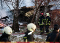 Emergency services at the DHL cargo plane crash site near Vilnius International Airport on Nov. 25. Photographer: Petras Malukas/AFP/Getty Images