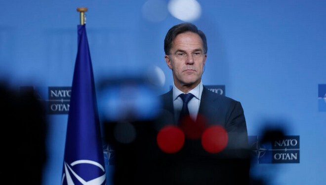 NATO Secretary General Mark Rutte delivers a statement during a joint press conference with Romanian Prime Minister Ion Marcel Ciolacu before a meeting at NATO headquarters in Brussels on Monday, Nov. 18, 2024. (AP Photo/Omar Havana)