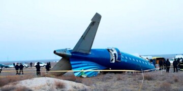 In this photo taken from a video released by the administration of Mangystau region, a part of Azerbaijan Airlines' Embraer 190 lies on the ground near the airport of Aktau, Kazakhstan, on Thursday, Dec. 26, 2024. (The Administration of Mangystau Region via AP)