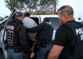 ICE Field Office Director, Enforcement and Removal Operations, David Marin and U.S. Immigration and Customs Enforcement's (ICE) Fugitive Operations team arrest a Mexican national at a home in Paramount, California, U.S., March 1, 2020. REUTERS/Lucy Nicholson