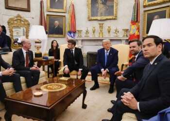 France's President Emmanuel Macron, from center to right, President Donald Trump, Vice President JD Vance and Secretary of State Marco Rubio attend a meeting in the Oval Office of the White House in Washington, Monday, Feb. 24, 2025. (Ludovic Marin/Pool via AP)