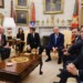 France's President Emmanuel Macron, from center to right, President Donald Trump, Vice President JD Vance and Secretary of State Marco Rubio attend a meeting in the Oval Office of the White House in Washington, Monday, Feb. 24, 2025. (Ludovic Marin/Pool via AP)