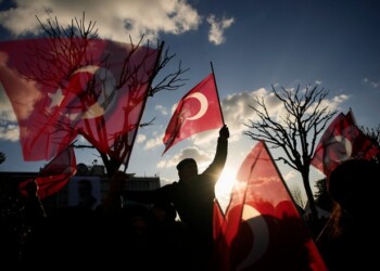 People gather outside the City Hall to protest the arrest of Istanbul Mayor Ekrem Imamoglu in Istanbul, Turkey, Wednesday, March 19, 2025. (AP Photo/Emrah Gurel)