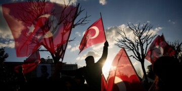 People gather outside the City Hall to protest the arrest of Istanbul Mayor Ekrem Imamoglu in Istanbul, Turkey, Wednesday, March 19, 2025. (AP Photo/Emrah Gurel)