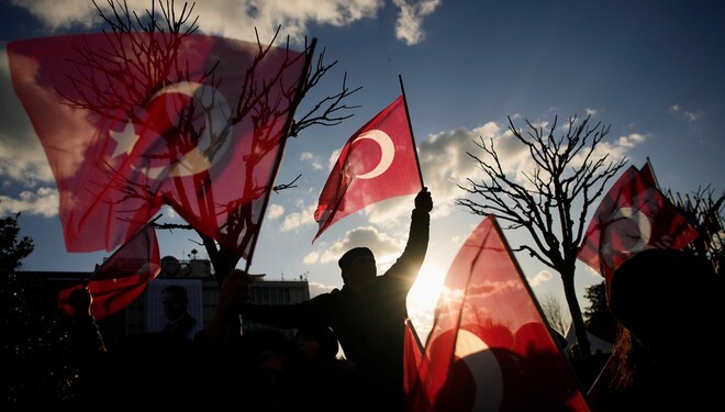 People gather outside the City Hall to protest the arrest of Istanbul Mayor Ekrem Imamoglu in Istanbul, Turkey, Wednesday, March 19, 2025. (AP Photo/Emrah Gurel)