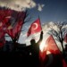 People gather outside the City Hall to protest the arrest of Istanbul Mayor Ekrem Imamoglu in Istanbul, Turkey, Wednesday, March 19, 2025. (AP Photo/Emrah Gurel)